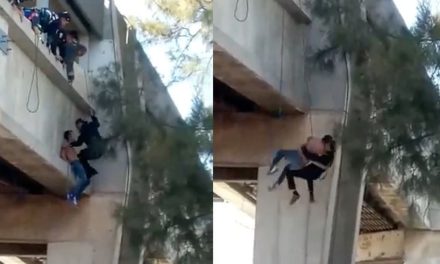 Policía héroe salva a hombre que pretendía suicidarse; caen y el oficial termina hospitalizado (Video)