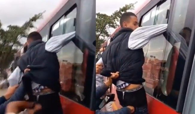 Video: Ladrón termina colgado de un camión y gente aprovecha para golpearlo y robarlo